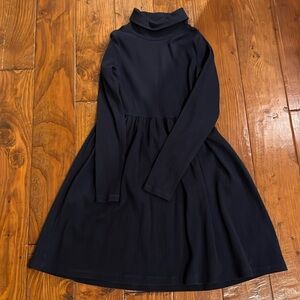 Girls crew cuts, navy net turtleneck dress